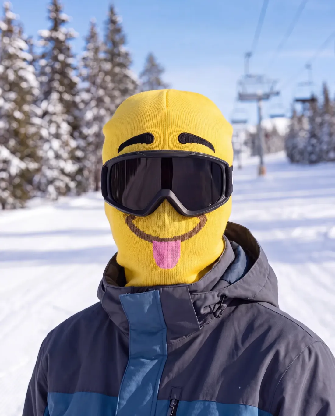 Sofia L. wearing the DERP noggos. character ski mask on a chairlift